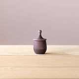 Grapat Wunschbox "Little Things" in lila, eine kleine Holzdose mit Deckel zum Kreiseln.