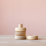 Holzscheibe und Stäbchen