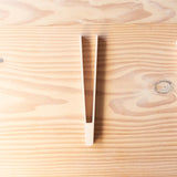 Eine Holzzange von Kokomoo.