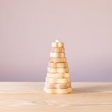 Vorderansicht eines Stapelturmes aus 10 geöltem blumenförmigen Scheiben.