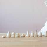 Die 10 verschiedenen Formen der Mandalsteine in einer Reihe aufgestellt, die im 120-teiligen Set von Grapat vorkommen.