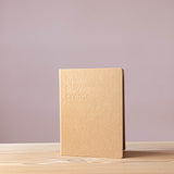 Das Ideenbuch zu Stapelstein "Move Play Create", zu sehen das braune Cover.